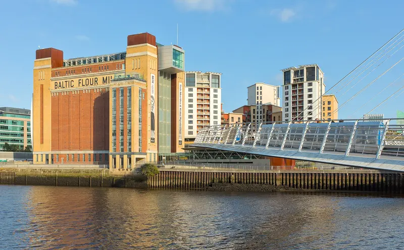 The brick Baltic Flour Mill art centre beside the Gateshead Millennium Bridge on the Tyne